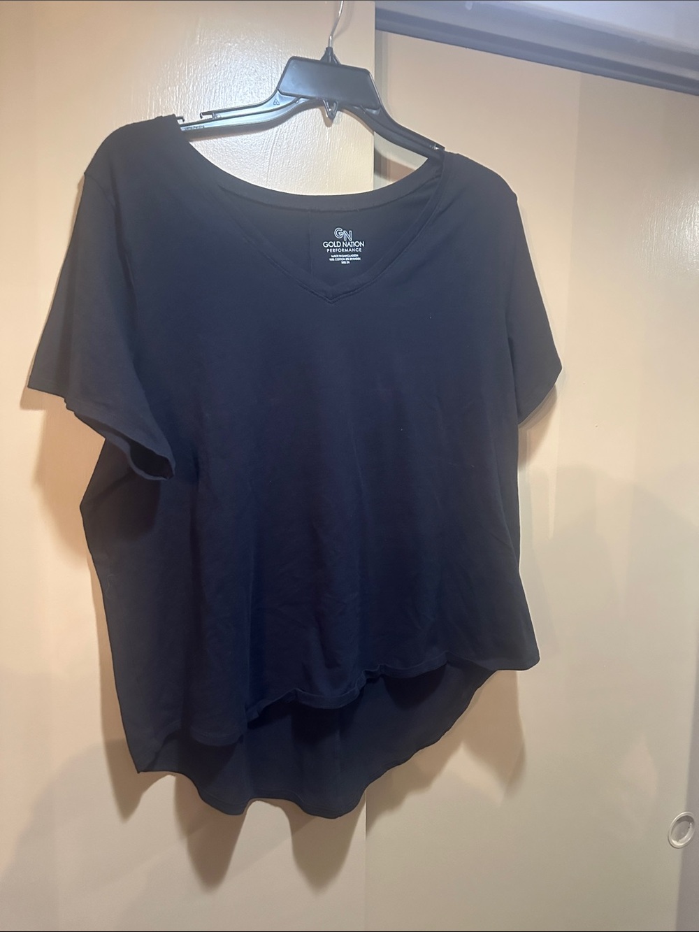 Gold Nation Black V-Neck Short Sleeve Tee with High-Low Hem